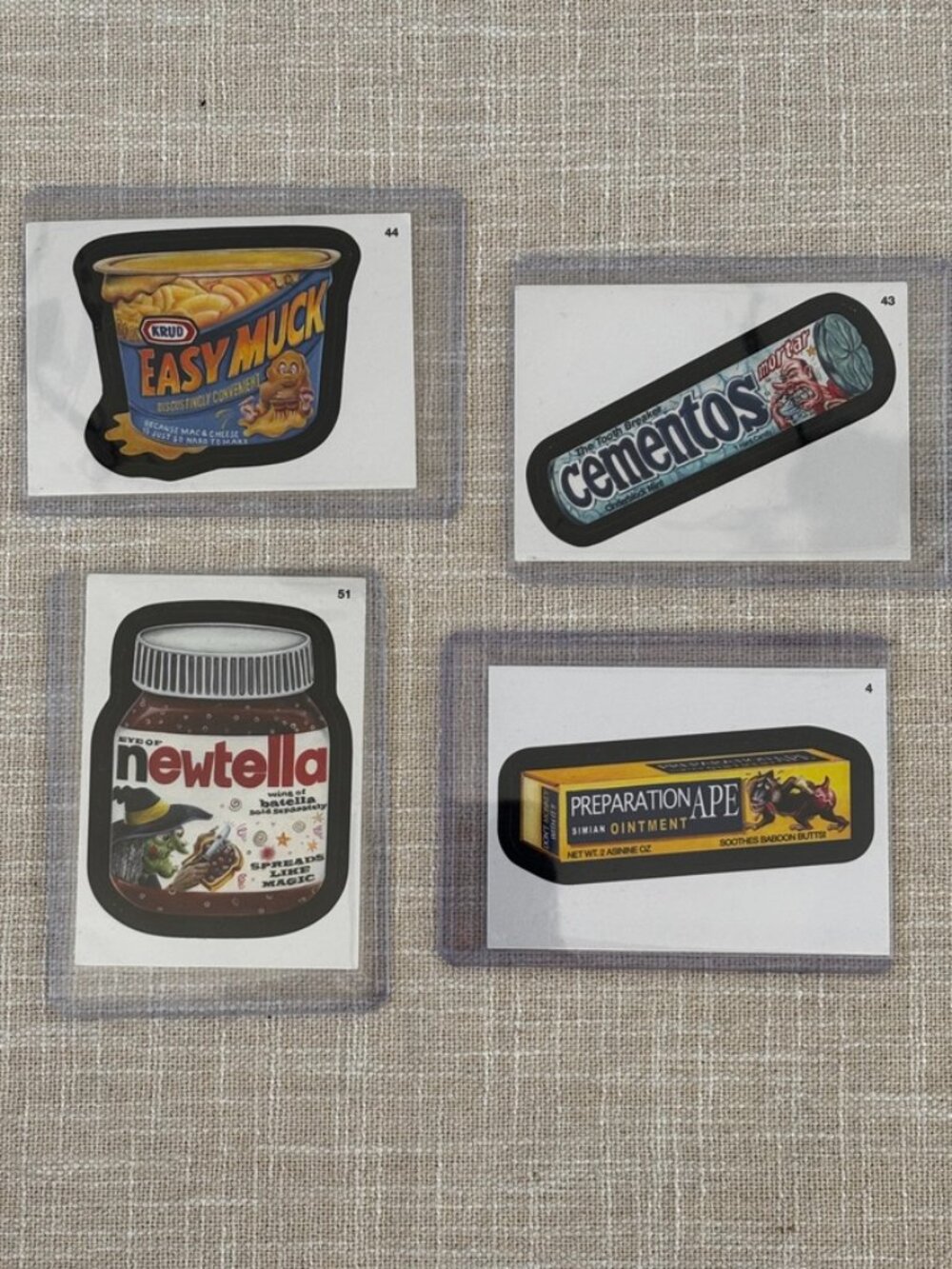2013 Topps Wacky Packages Sticker Cards Lot of 4 Newtella Cementos Easy Muck